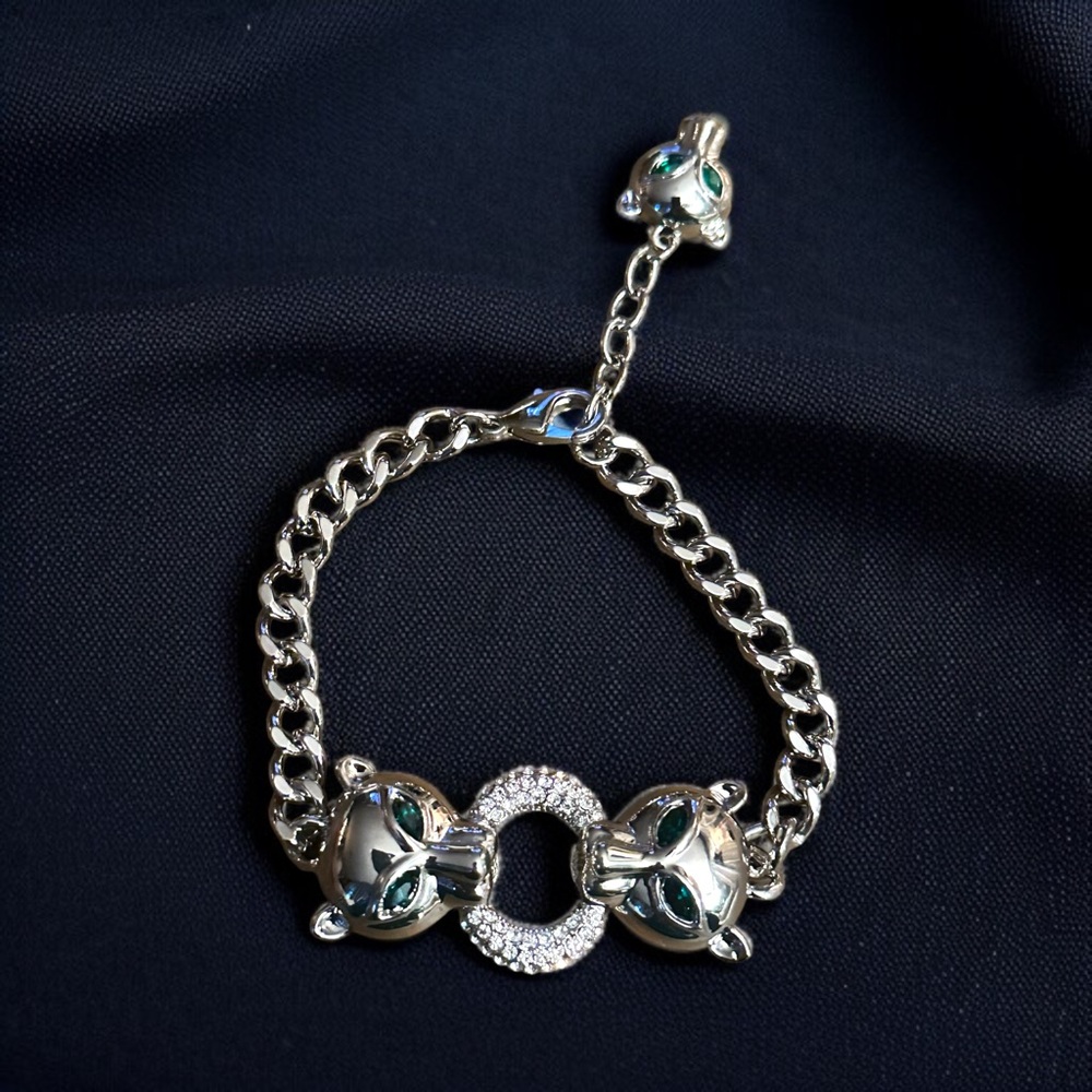Silver tone double panther head chain bracelet